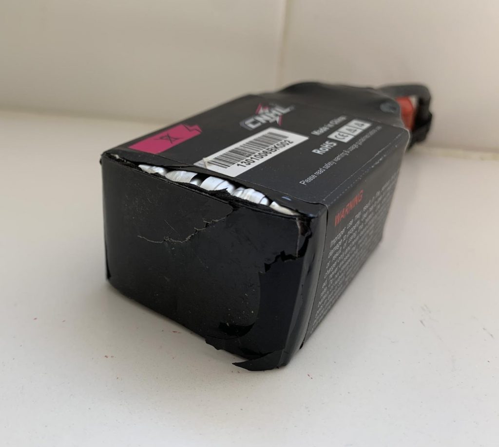 CNHL battery with protective wrapping